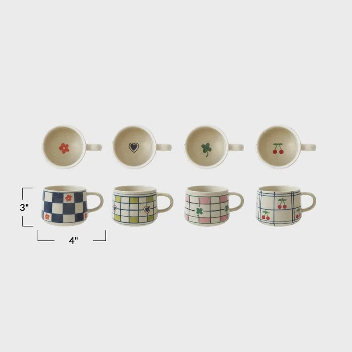 Eight colorful hand-painted stoneware mugs with floral, checkered, and cherry patterns