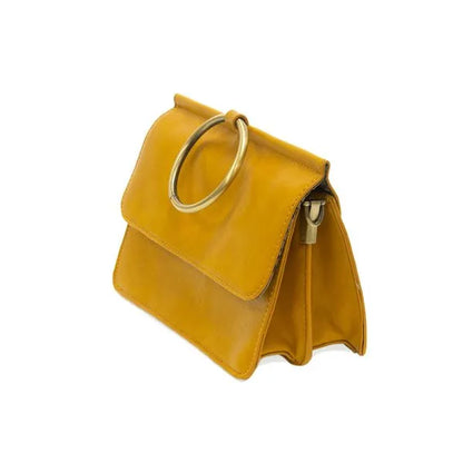 Yellow leather ARIA RING BAG with circular handle, interior zip, ideal for women’s boho chic clothing