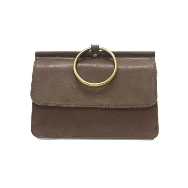 Brown leather ARIA RING BAG with gold ring handle, perfect for women’s boho chic clothing