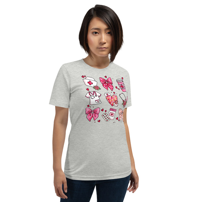 Coquette nurse graphic tee with stethoscope, scrubs, and syringes