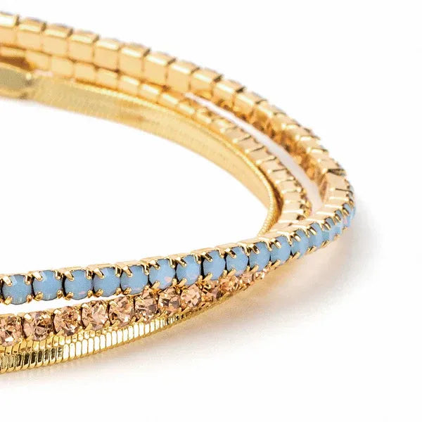 Gold-toned Dainty Gold and Rhinestone Layered Bracelet Set with light blue crystal stones