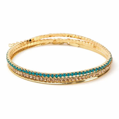 Gold-toned bangle bracelet with turquoise and clear rhinestones in Dainty Gold Bracelet Set