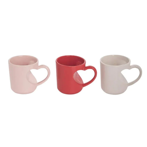 Three heart shaped mugs in pink, red, and white perfect for Valentine’s Day gifts