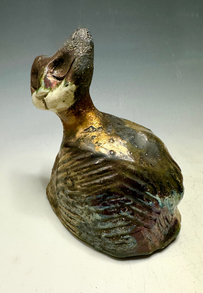 She's a pet with major  6" x 5" x 5" personality! This tiny wonder packs a powerful punch, boasting a stunning metallic patina and a lightweight design. Let her bring joy to any room with her endearing kitty cheer - she's sure to win your heart!