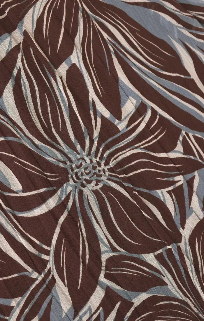 A lanie zinn floral maxi dress in brown and white floral patterned fabric with subtle texture