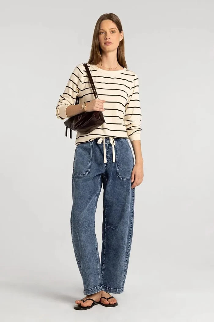 Blue denim jeans with drawstring waist and patch pockets paired with long sleeve basic stacy top from basics collection