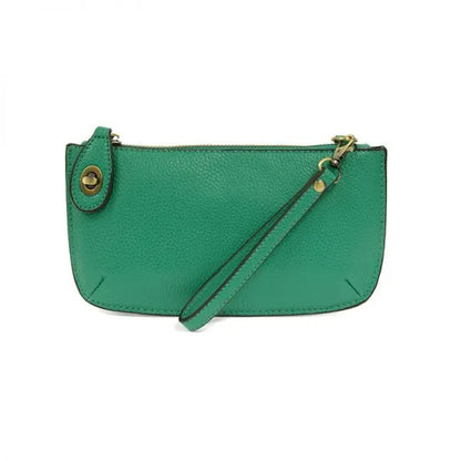 Green faux leather wristlet with card slots from the MINI CROSSBODY WRISTLET CLUTCH