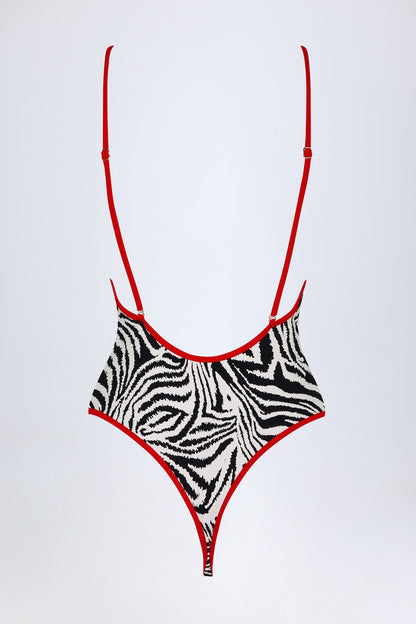 Charm-Detail Cross-Back Swimsuit in Zebra Print
