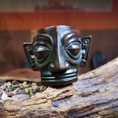 Replica Bronze Head Mask from Sanxingdui Ruins - Tibetan Buddhist art, close-up detail
